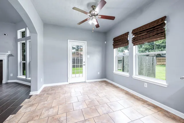 a kitchen with stainless steel appliances granite countertop a sink stove microwave and cabinets