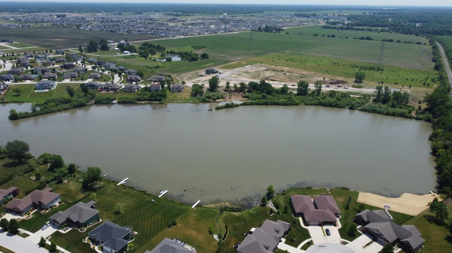 10131 Springlake Road St. John, IN 46373 - Photo 11 of 13 an aerial view of a house with a lake view