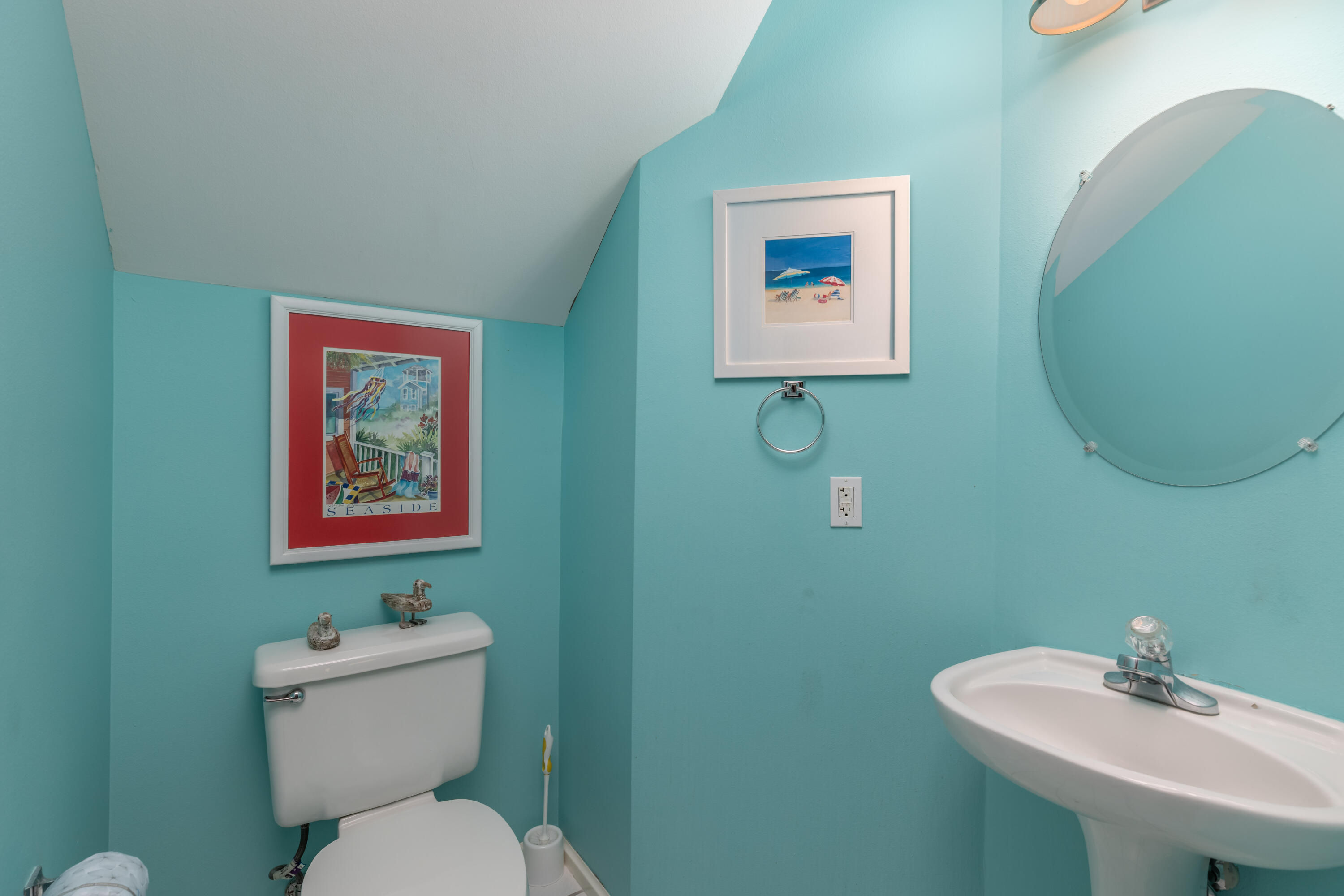 8537 Turnberry Court, Unit 8537 Miramar Beach, FL 32550 - Photo 15 of 18 a bathroom with a toilet a sink and mirror