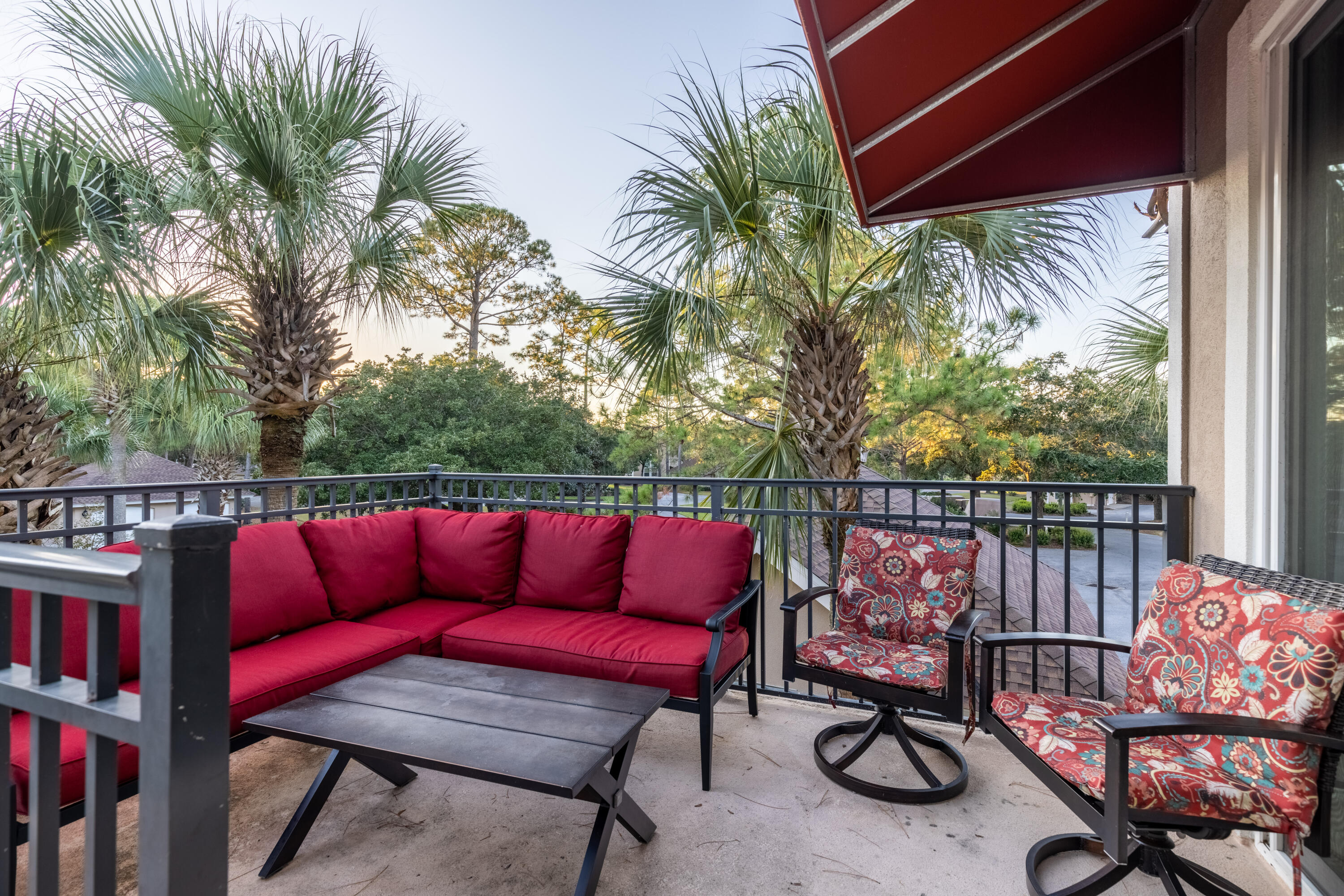 8537 Turnberry Court, Unit 8537 Miramar Beach, FL 32550 - Photo 17 of 18 a view of a chairs and table in the patio