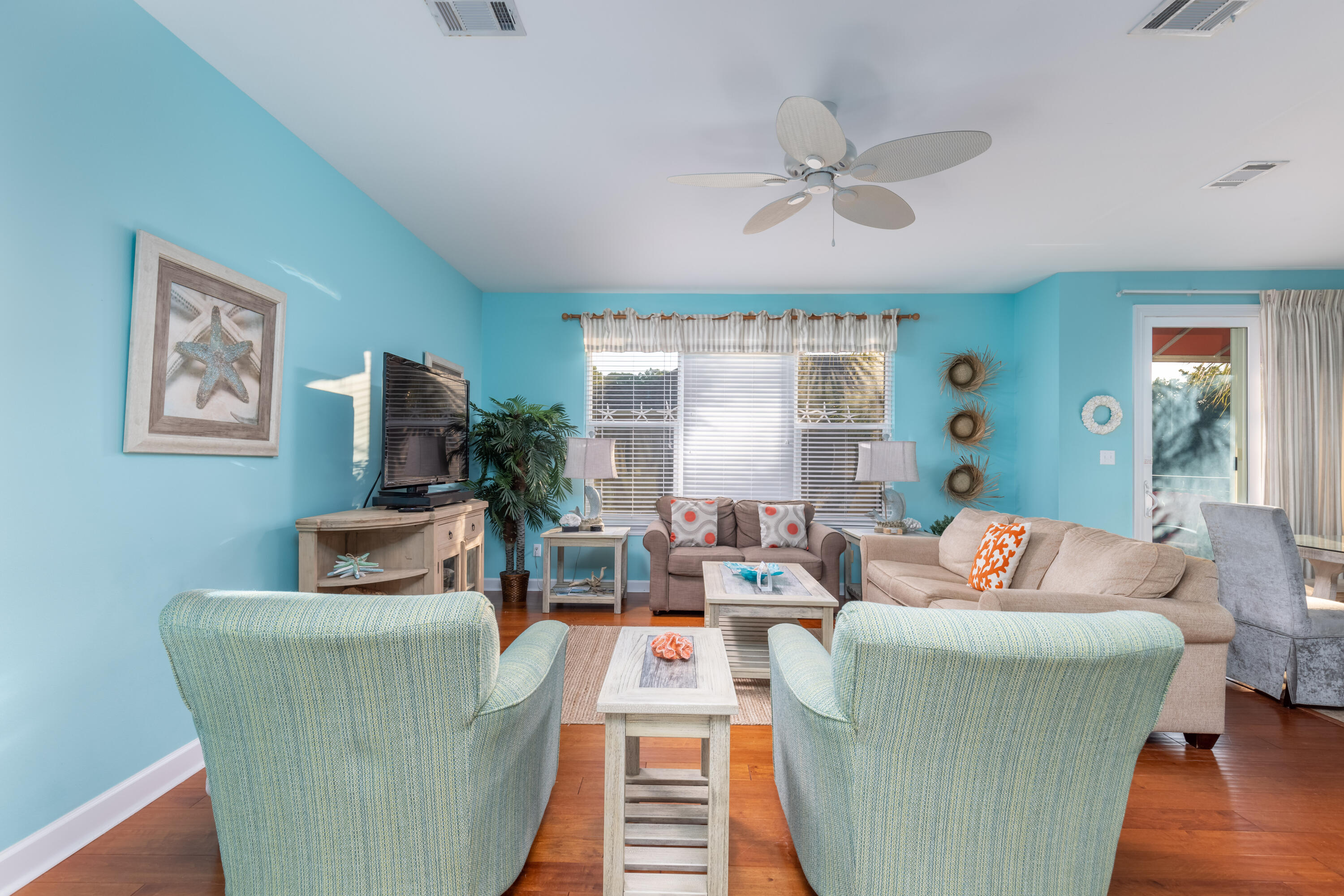 8537 Turnberry Court, Unit 8537 Miramar Beach, FL 32550 - Photo 7 of 18 a living room with furniture and a large window