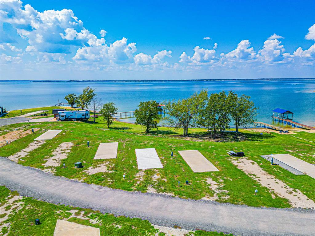 Lot 34 Waterfront Road Kerens, TX 75144 - Photo 13 of 39 a view of a house with a yard