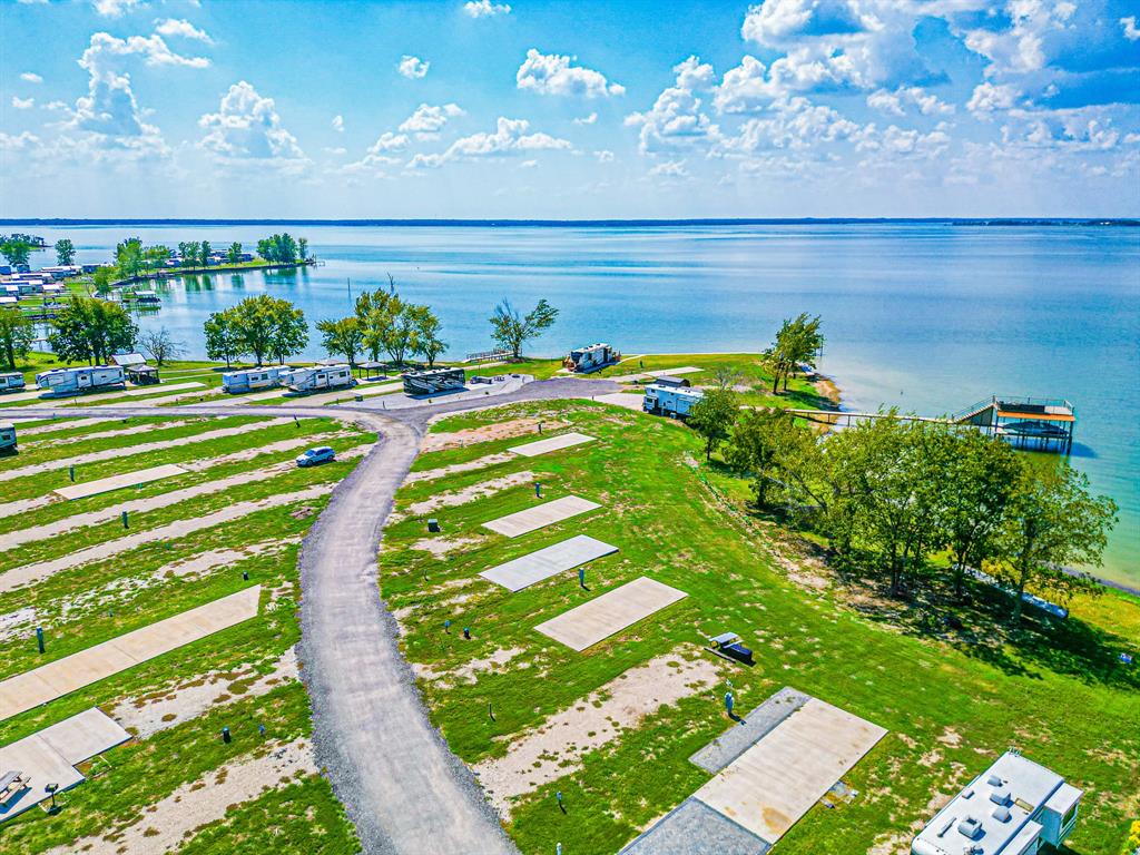 Lot 34 Waterfront Road Kerens, TX 75144 - Photo 16 of 39 a view of a swimming pool with an outdoor space