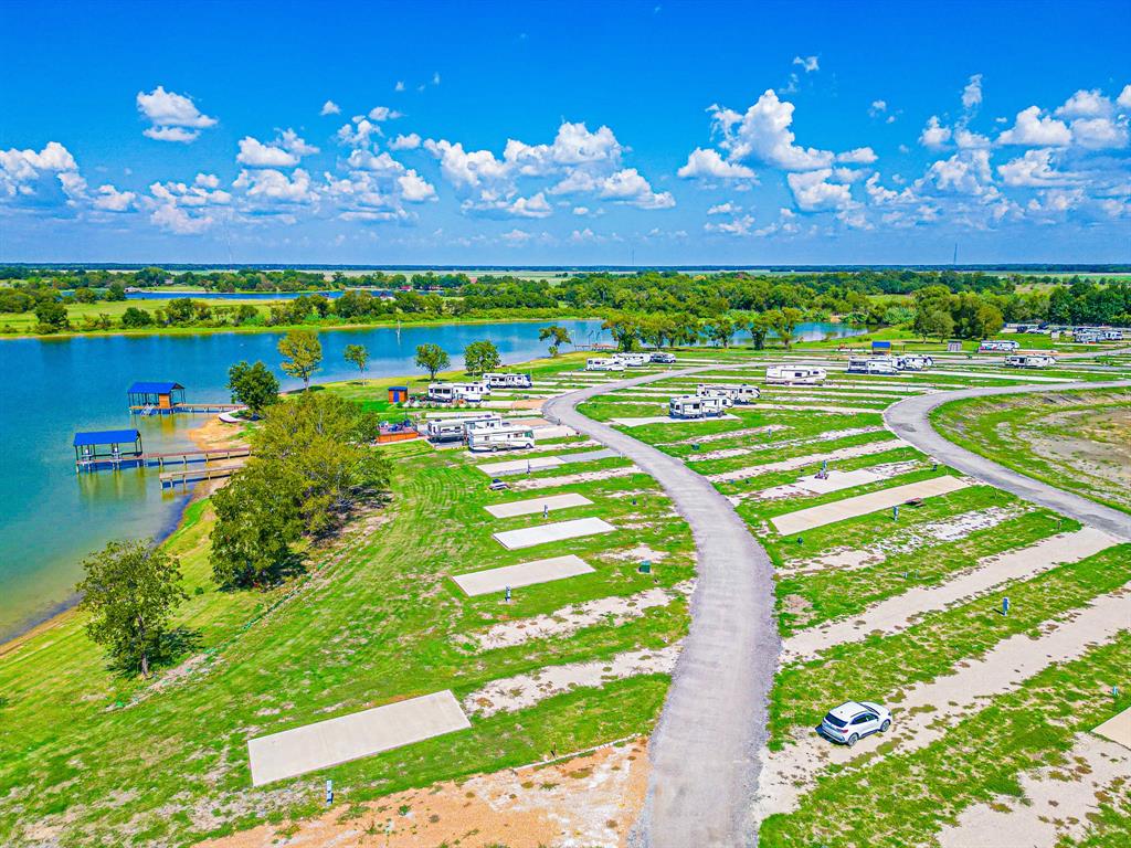 Lot 34 Waterfront Road Kerens, TX 75144 - Photo 25 of 39 a view of a golf course with a lake view