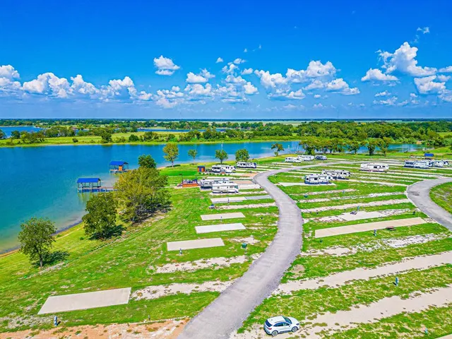 a view of a golf course with an ocean view