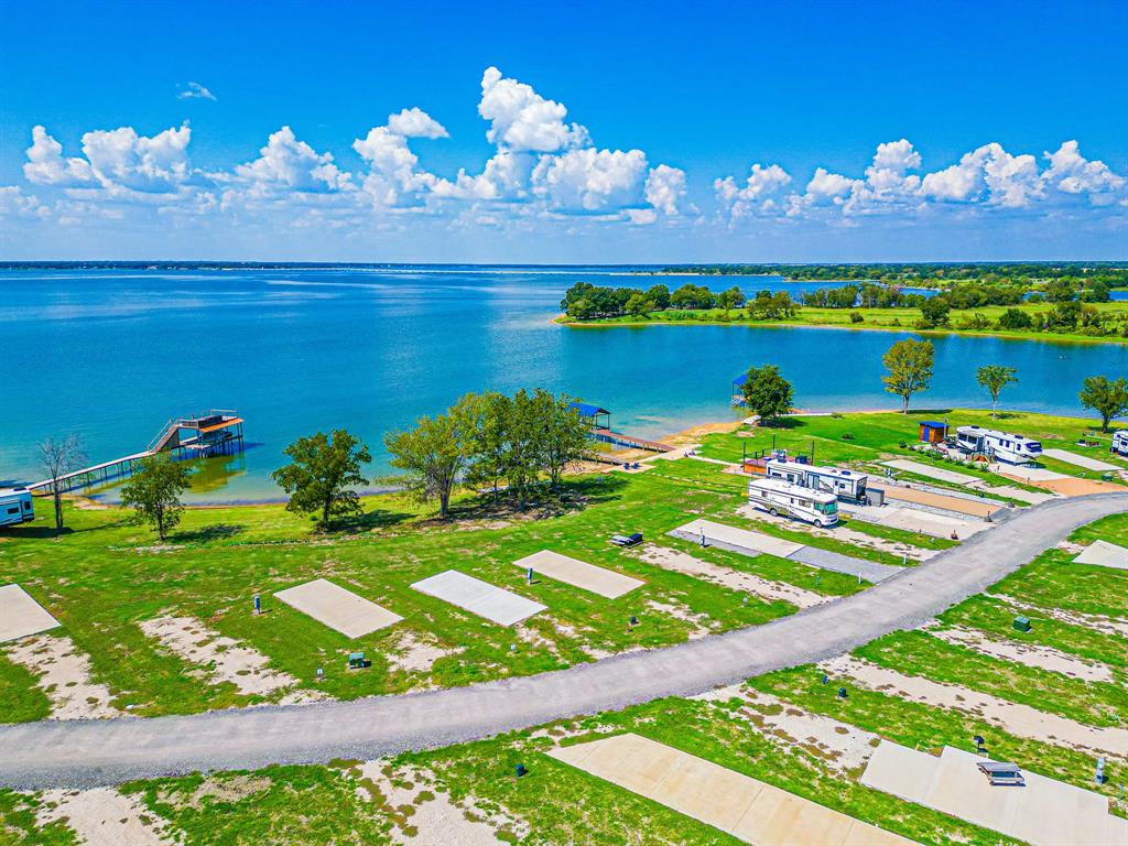 Lot 34 Waterfront Road Kerens, TX 75144 - Photo 29 of 39 a view of a golf course with a garden