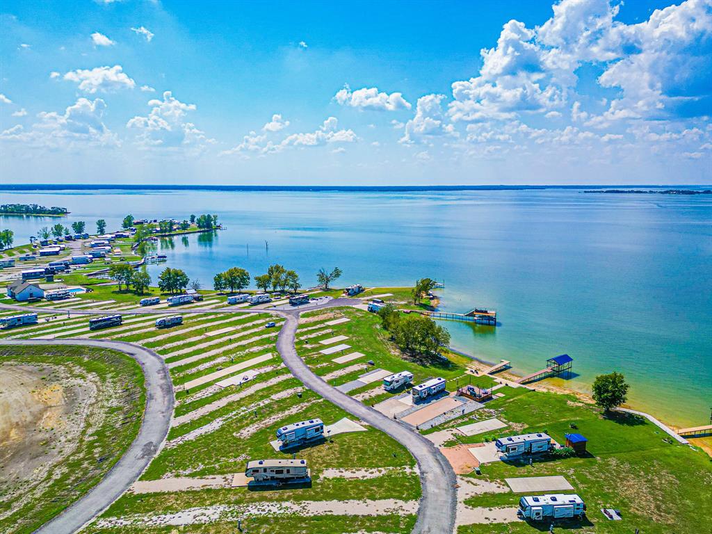 Lot 34 Waterfront Road Kerens, TX 75144 - Photo 34 of 39 a view of a room with lots of trees in the background