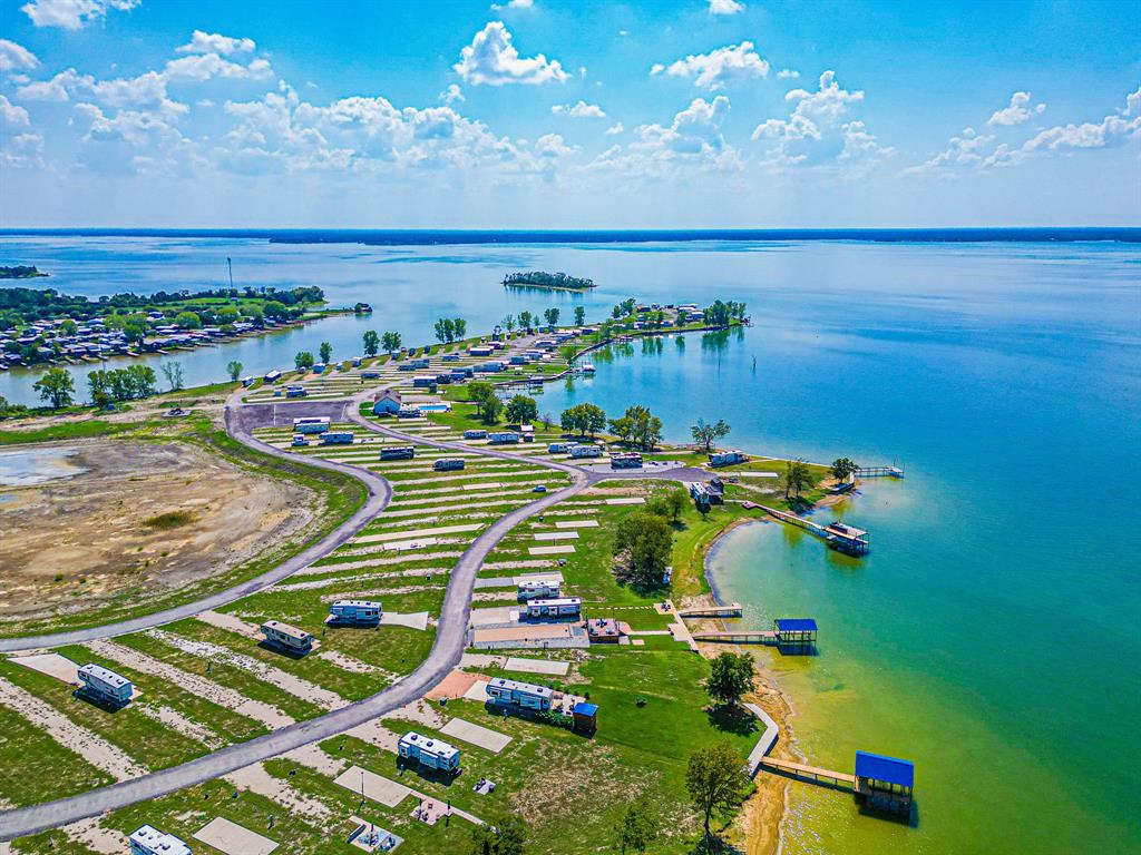 Lot 34 Waterfront Road Kerens, TX 75144 - Photo 36 of 39 an aerial view of a pool patio patio and outdoor seating