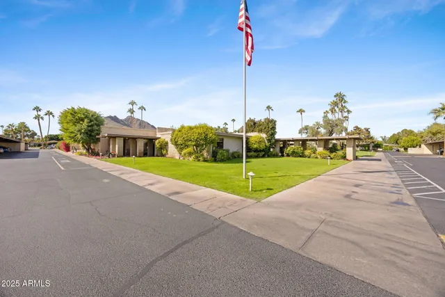 a house with garden in front of it