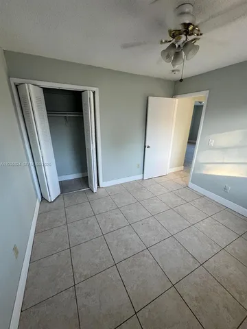 a view of a livingroom with a staircase