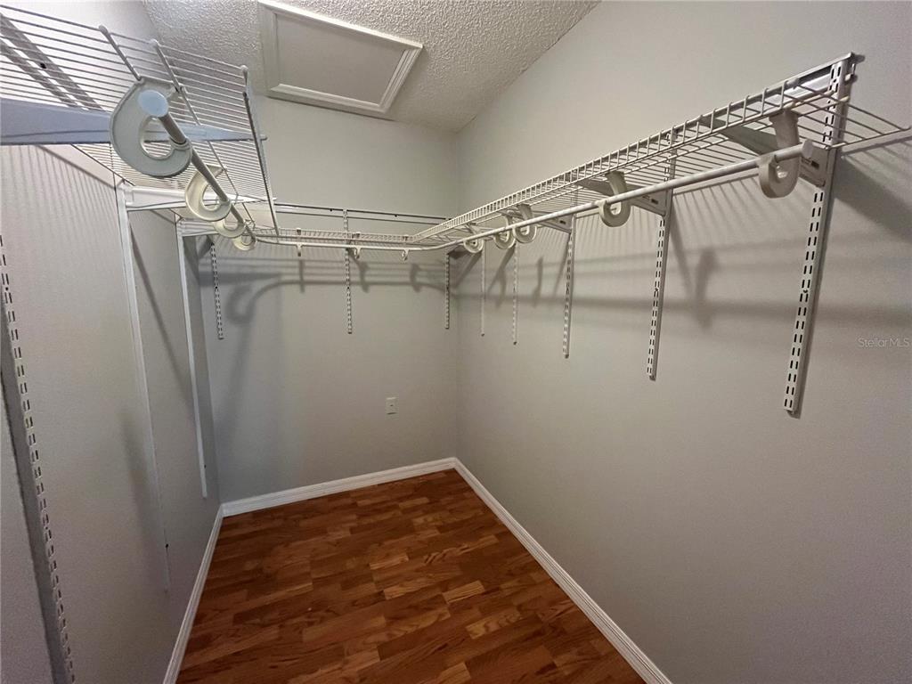8122 Matthew Drive New Port Richey, FL 34653 - Photo 11 of 25 a view of a room with racks on the wall