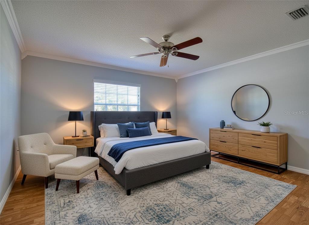 8122 Matthew Drive New Port Richey, FL 34653 - Photo 13 of 25 a bed room with a bed and window