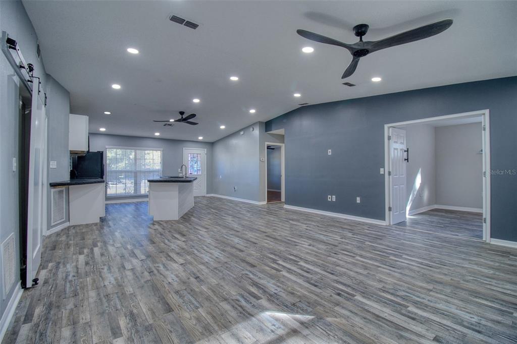 8122 Matthew Drive New Port Richey, FL 34653 - Photo 8 of 25 a view of kitchen with a sink and stainless steel appliances
