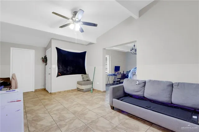 a living room with furniture and view of living room