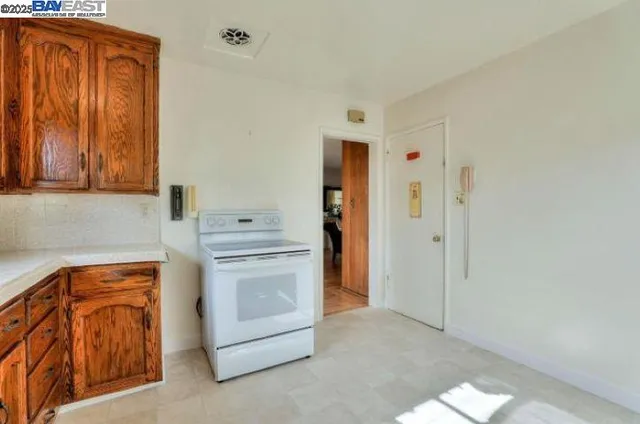 a view of kitchen and utility room