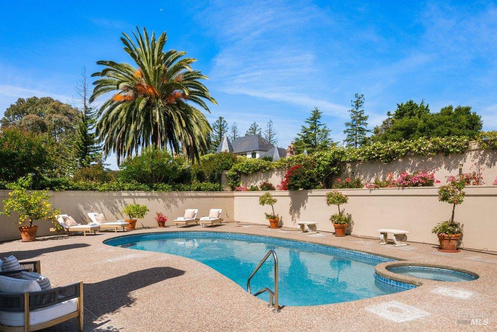 82 McNear Drive San Rafael, CA 94901 - Photo 10 of 54 a view of a swimming pool with a patio