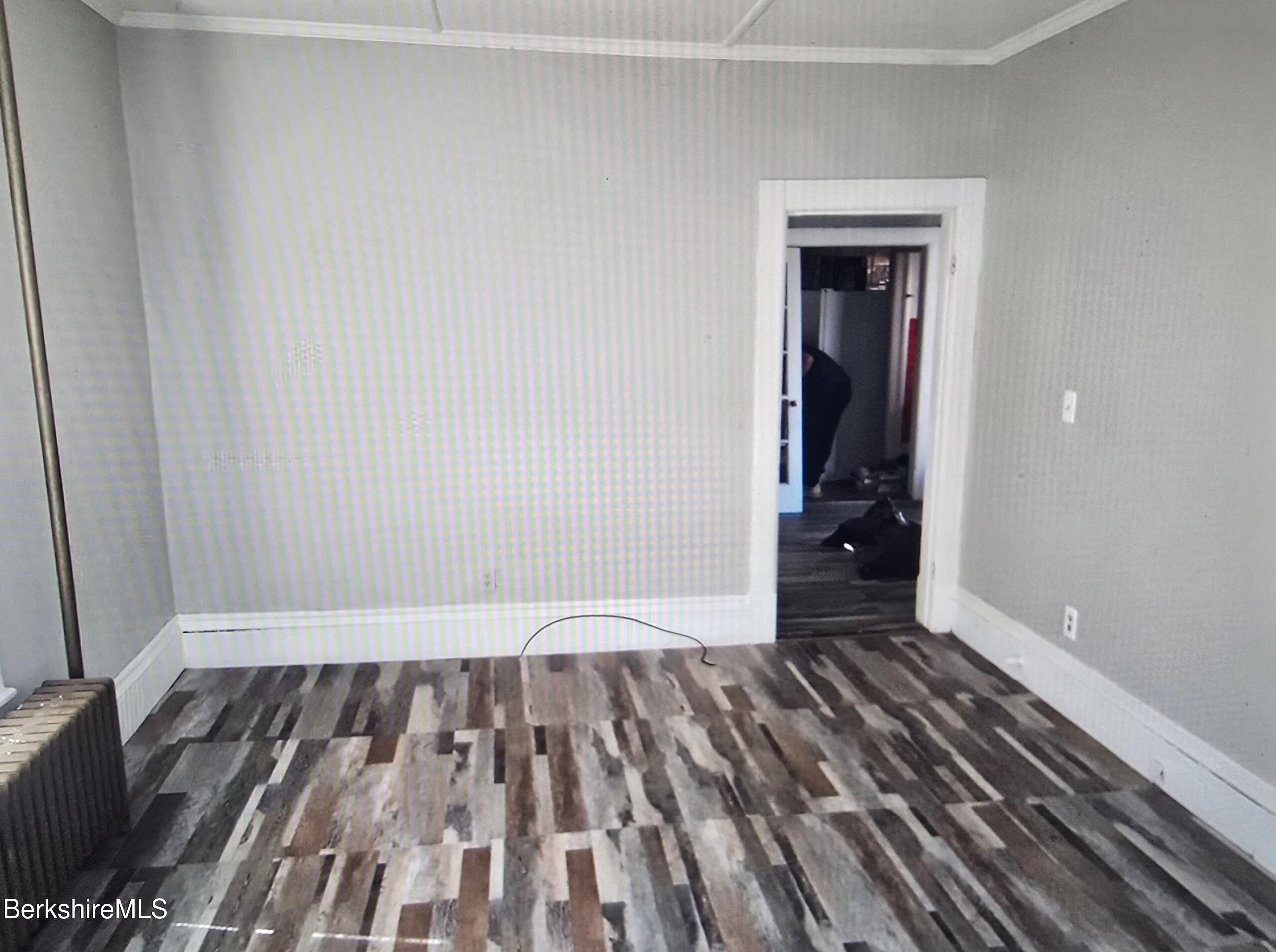 301 Walnut Street North Adams, MA 01247 - Photo 6 of 12 a view of a room with wooden floor and a rug