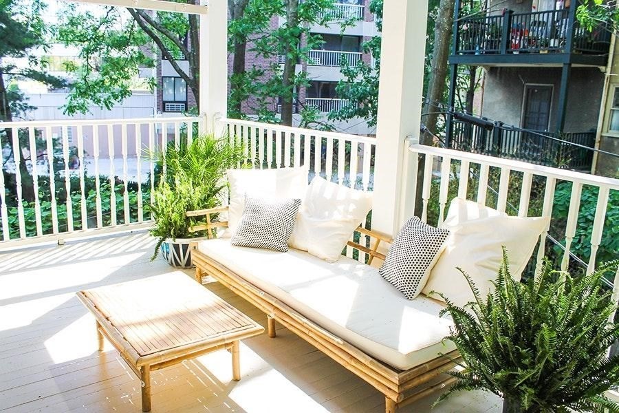 15 Trowbridge Street, Unit 8 Cambridge, MA 02138 - Photo 5 of 17 a view of a chairs and table in the balcony