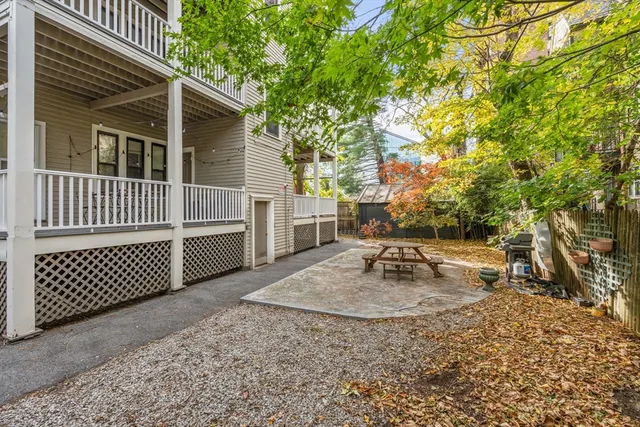 a view of backyard and deck