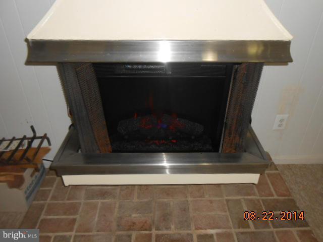 13103 Venango Road Fort Washington, MD 20744 - Photo 23 of 29 Basement - Fireplace