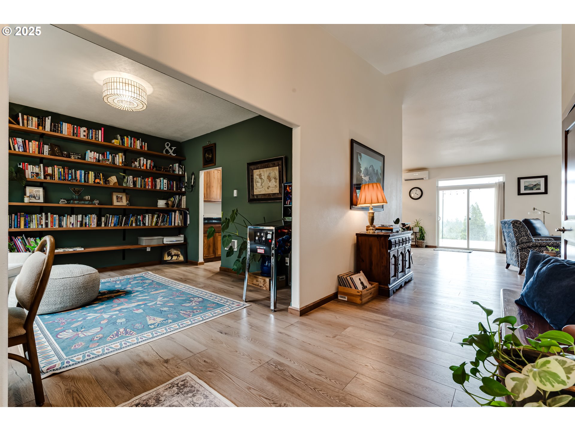 31490 Fox Hollow Road Eugene, OR 97405 - Photo 6 of 40 a living room with furniture and a wooden floor