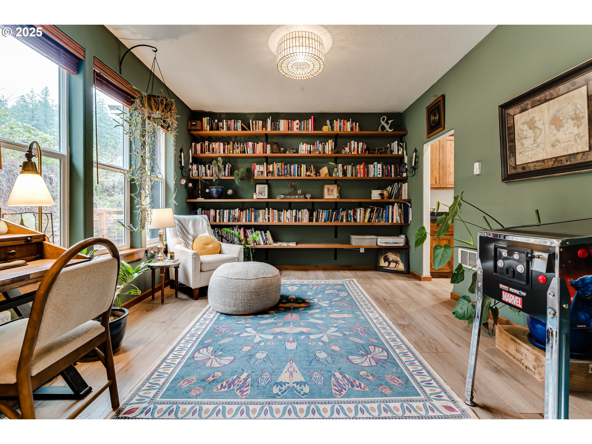 31490 Fox Hollow Road Eugene, OR 97405 - Photo 7 of 40 a living room with hard wood flooring and a couch