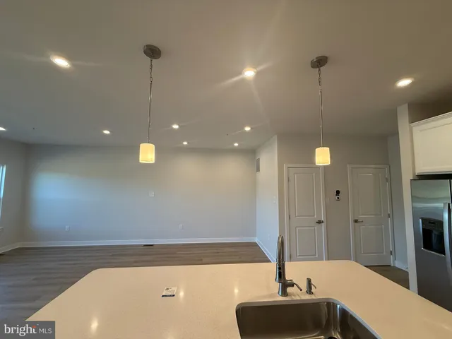 a bathroom with a bathtub and a sink