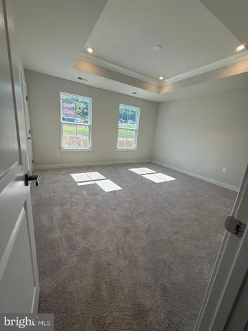 a view of a livingroom with a staircase