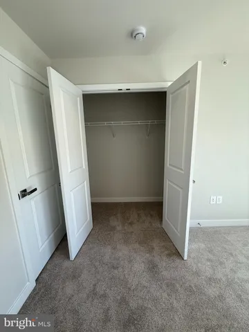 an empty room with closet