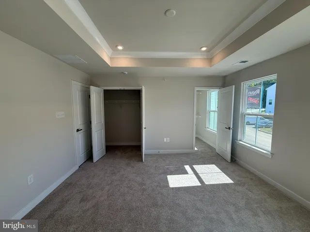 a view of empty room with windows