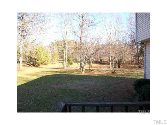 1547 Jack Clement Road Stem, NC 27581 - Photo 8 of 12 Great back yard with room for a garden.