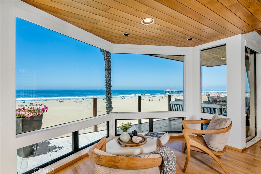 708 The Strand Manhattan Beach, CA 90266 - Photo 26 of 27 a living room with furniture and flowers