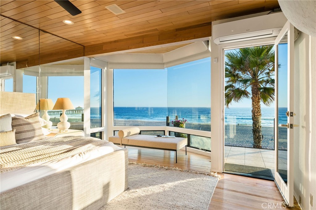 708 The Strand Manhattan Beach, CA 90266 - Photo 5 of 27 a kitchen with stainless steel appliances kitchen island granite countertop a sink and cabinets