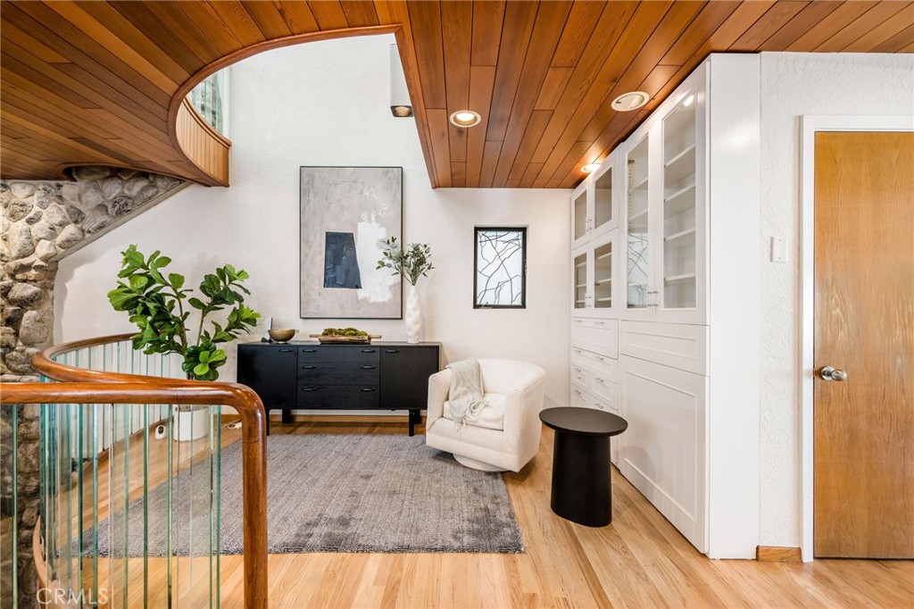 708 The Strand Manhattan Beach, CA 90266 - Photo 8 of 27 a living room with furniture and a potted plant