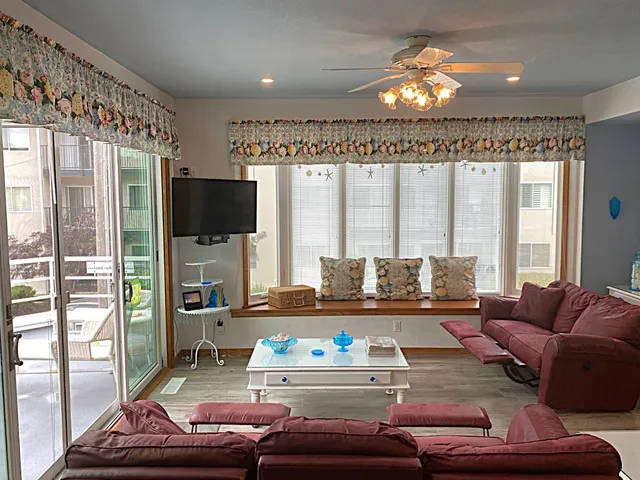 a bedroom with a bed and a table