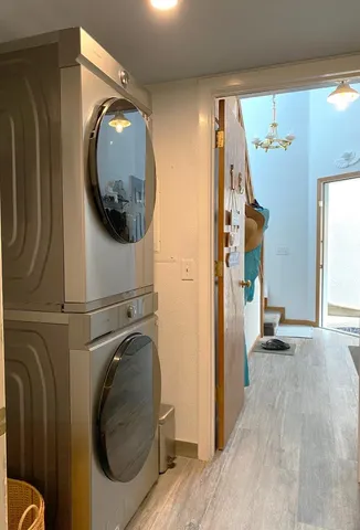 a view of a patio with table and chairs