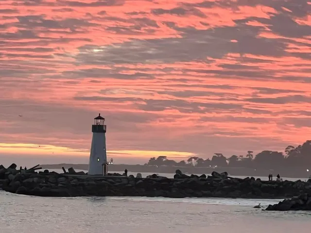 a view of swimming pool with an outdoor seating