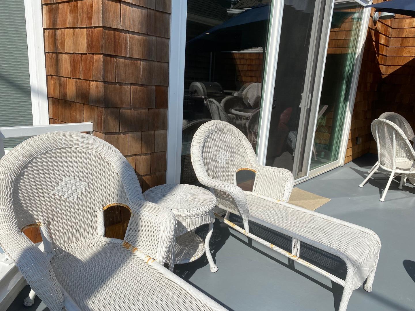 122 2nd Avenue Santa Cruz, CA 95062 - Photo 48 of 86 a view of a chairs and table in a balcony