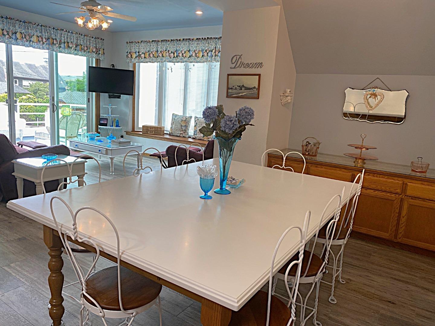 122 2nd Avenue Santa Cruz, CA 95062 - Photo 59 of 86 a dining table with chairs and window