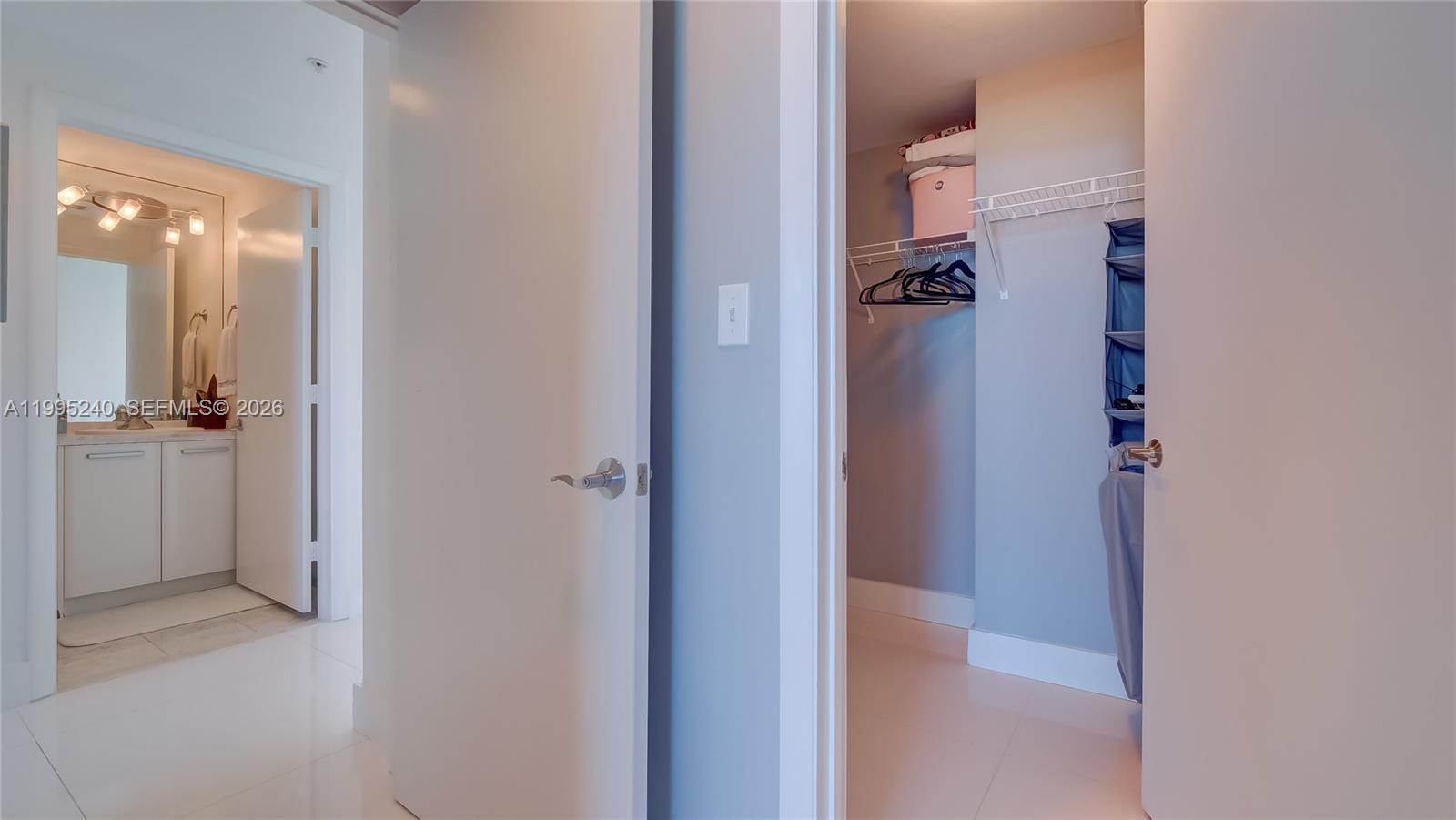 253 Northeast 2nd Street, Unit 3509 Miami, FL 33132 - Photo 25 of 49 a view of a bathroom from a corridor