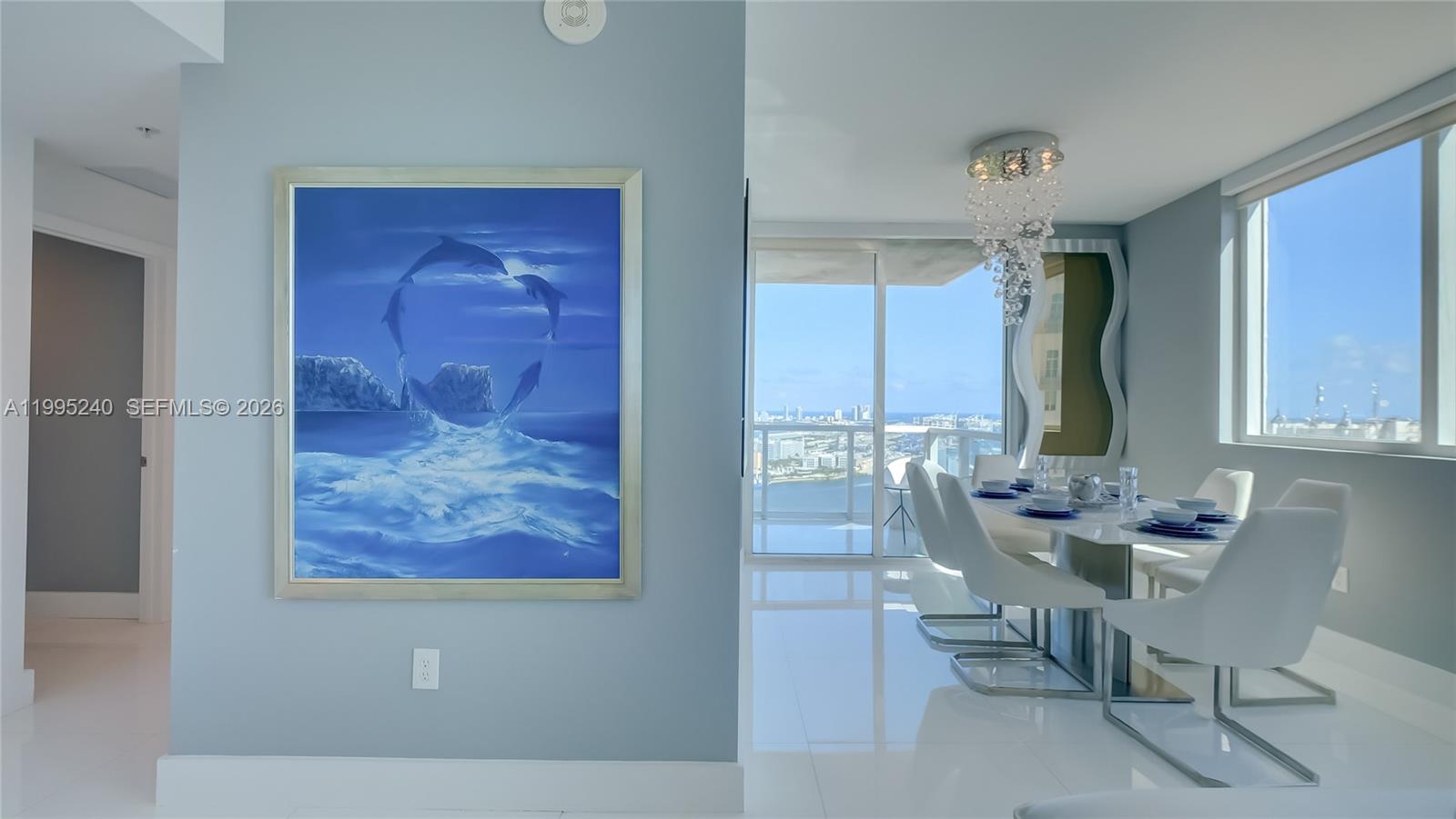 253 Northeast 2nd Street, Unit 3509 Miami, FL 33132 - Photo 39 of 49 a dining room with furniture and window