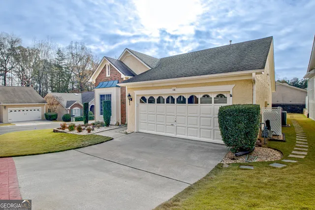 a view of a house with basketball court
