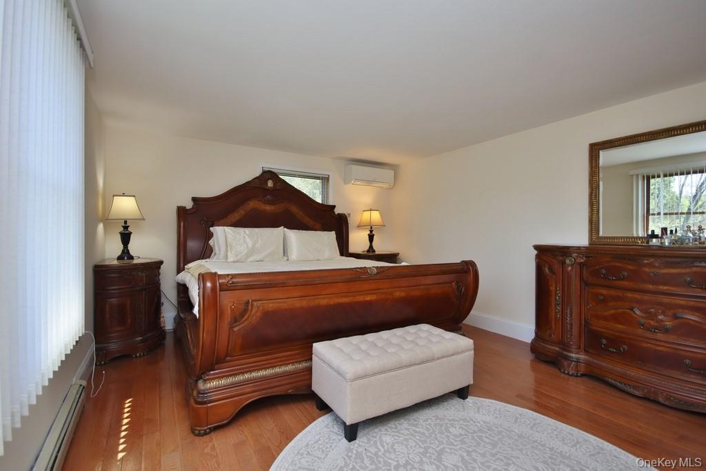 30 Granite Springs Road Granite Springs, NY 10527 - Photo 22 of 37 a bedroom with a bed and a dresser in it