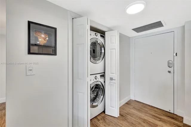 a bedroom with a bed and a ceiling fan