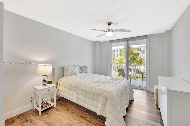 a bathroom with a sink toilet tub and shower