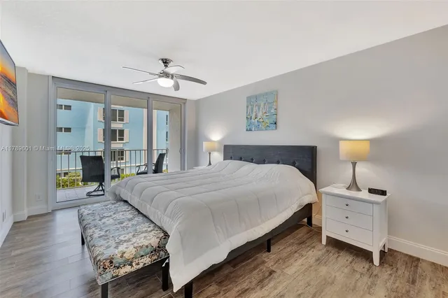 a view of a balcony with furniture