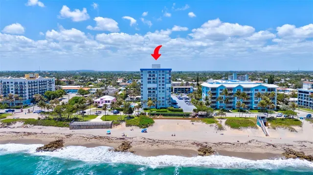 a kitchen with sink and cabinets