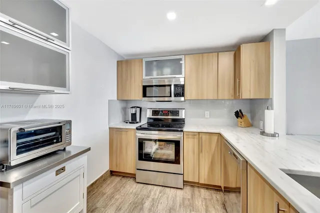 a living room with furniture flat screen tv and a fireplace