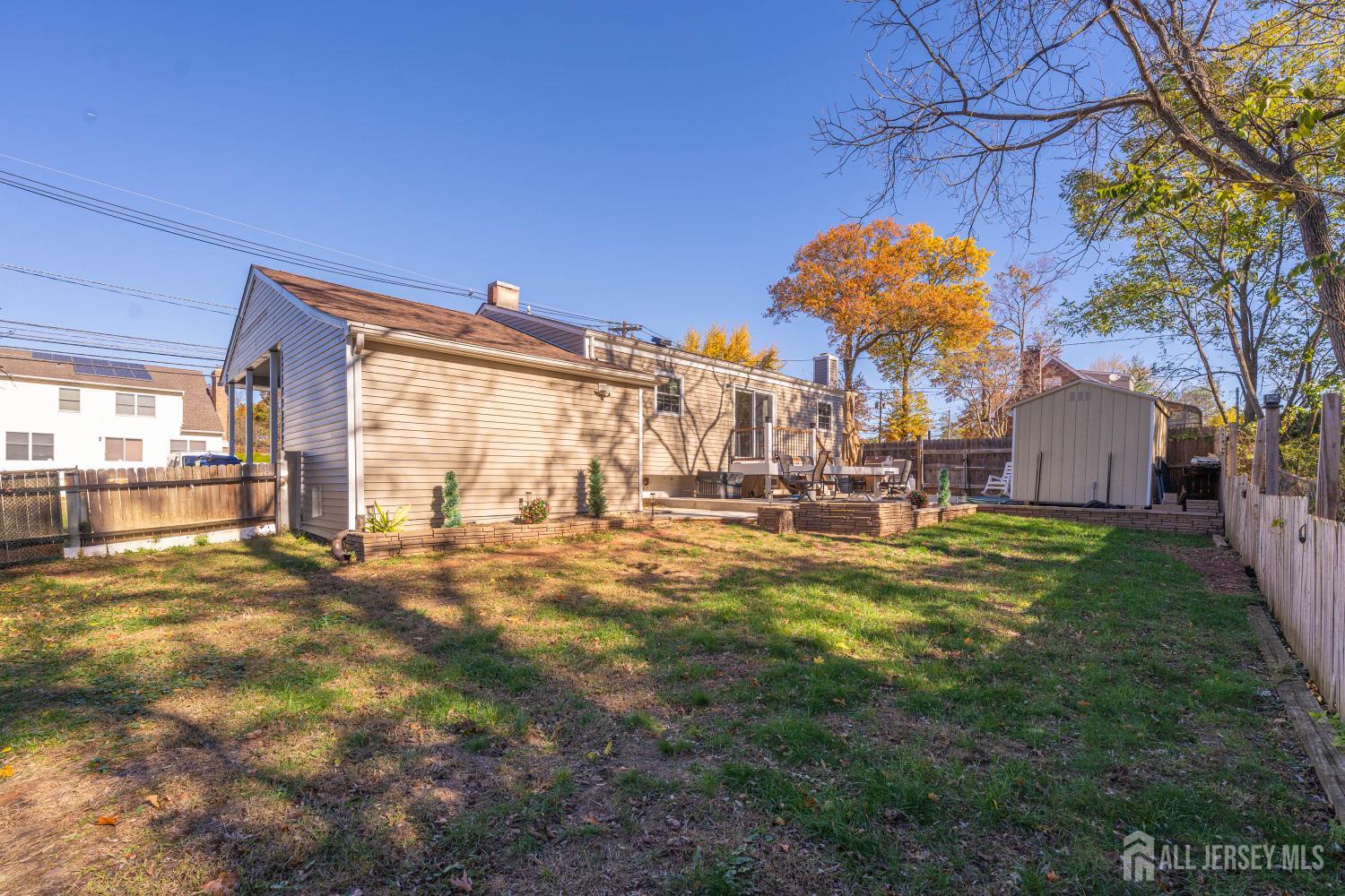 479 Chain O' Hills Road Colonia, NJ 07067 - Photo 17 of 18 a view of a house with a yard