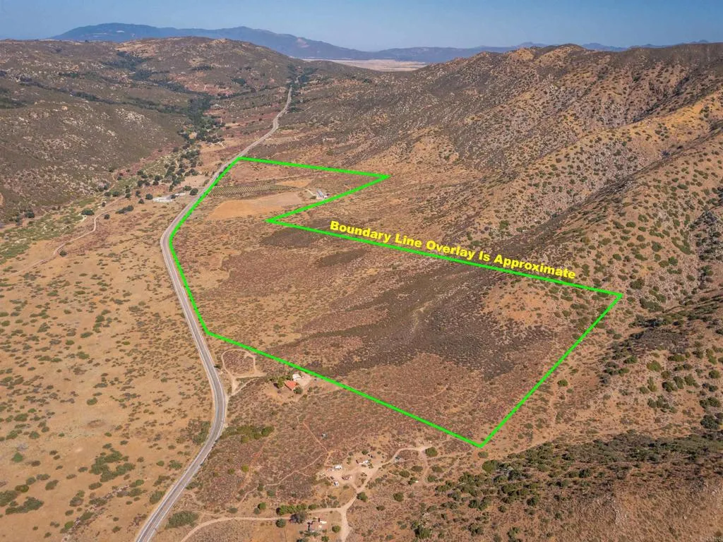 129 San Felipe Road Warner Springs, CA 92086 - Photo 23 of 23 a view of a dry yard with wooden fence
